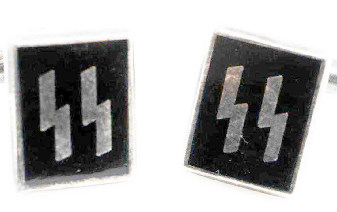 GERMAN THIRD REICH SS ENAMEL CUFF LINK SET: GERMAN WW2 THIRD REICH SS ENAMEL CUFF LINK SET Set of cufflinks with black enamel design of a set of SS sig runes. Marked on the back "RZM M1/183". In very good condition overall. The item is bought o