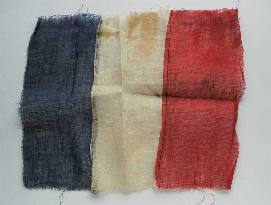 WW2 NATIONAL FLAG of FRANCE fr. DACHAU: WW2 NATIONAL FLAG of FRANCE, Belonged to Prisoner in DACHAU This item has a very tragic story. It was belonged to Marcel B. - we have some information from archive. CONDITION: The item is described to