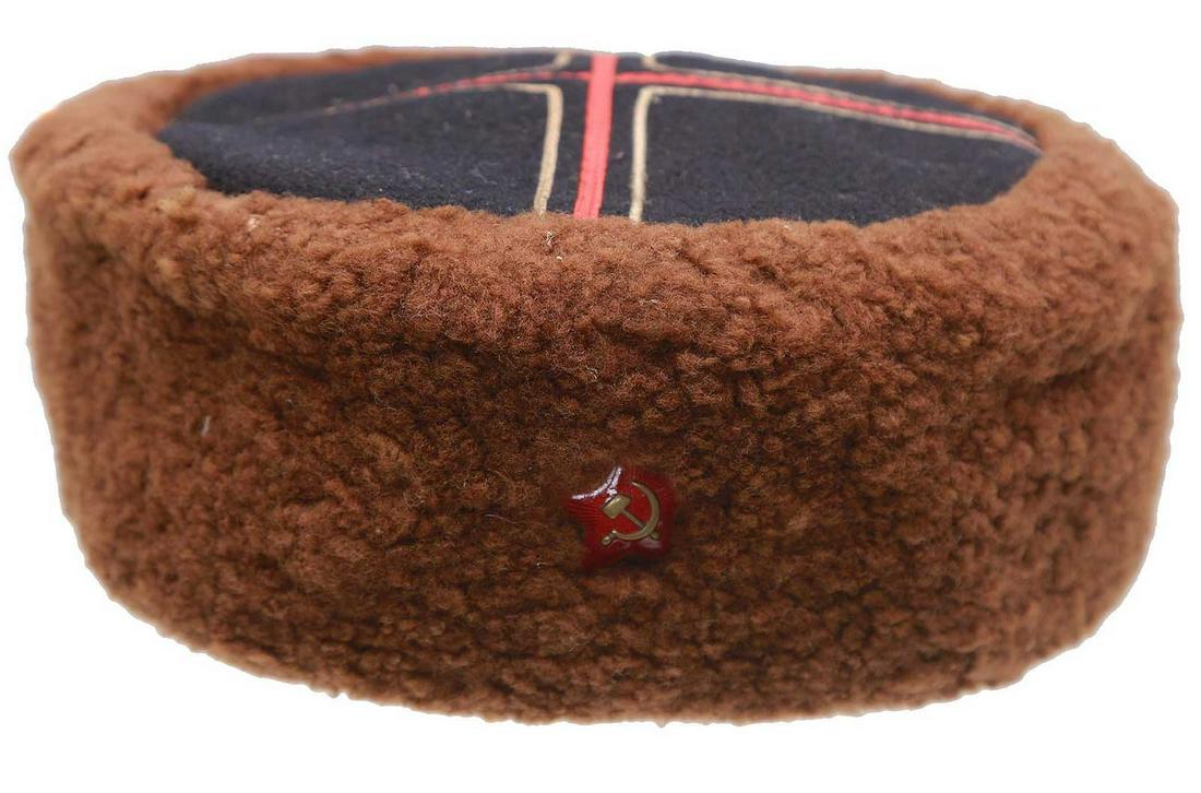 EARLY SOVIET RED ARMY COSSACK HAT, KUBANKA: EARLY SOVIET RED ARMY COSSACK HAT, KUBANKA A Russian Cossack fur hat (kubanka) with galoon on the top. Ca. 1920 (Russia Civil War). CONDITION: Good overall considering the age. ESTIMATE