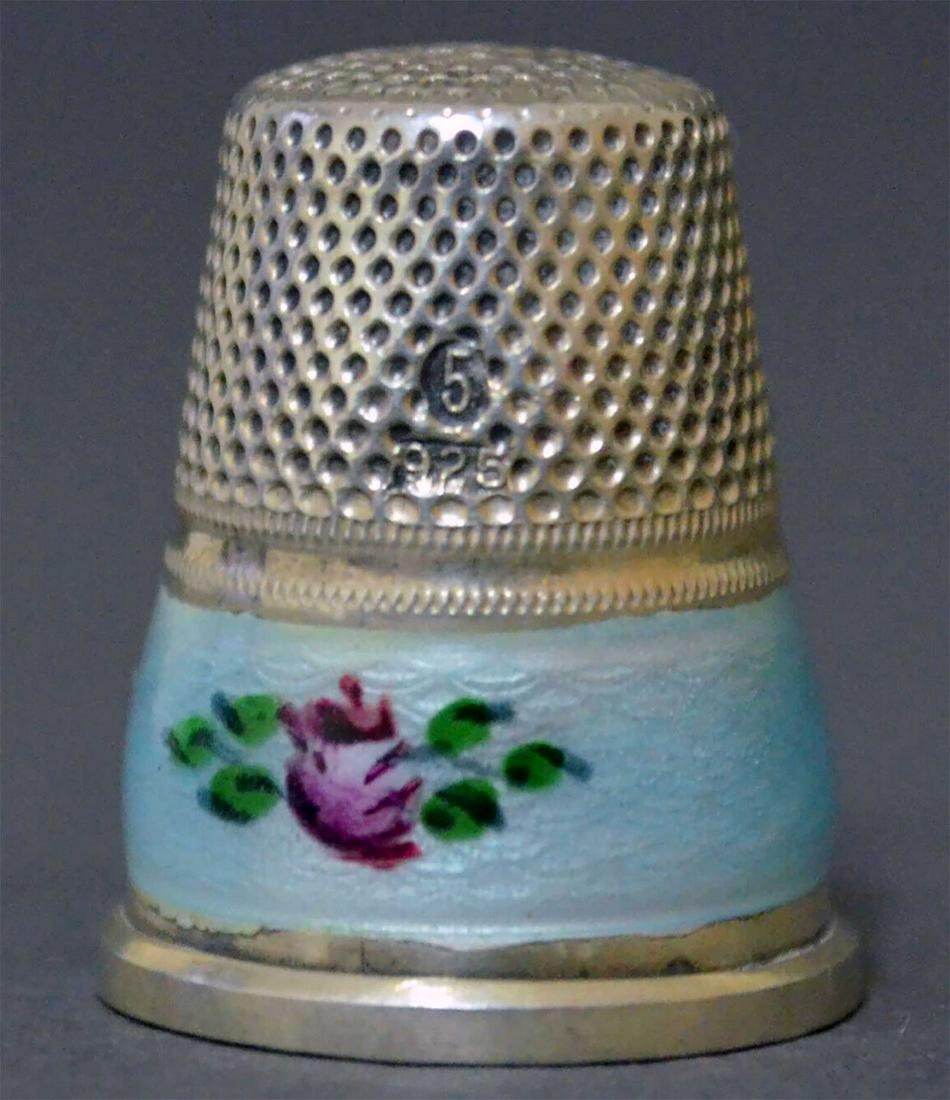 JEWISH STERLING SILVER and ENAMEL THIMBLE: JEWISH STERLING SILVER and ENAMEL THIMBLE with FLOWERS Attractive and collectible Continental sterling silver and enamel thimble, preserved in a great condition. On the top you can see a Star of David