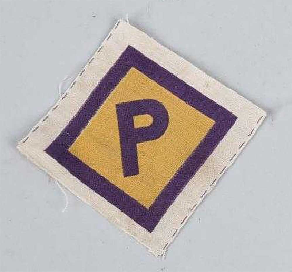 GERMAN WW2 PATCH for POLISH WORKER: GERMAN WW2 PATCH for POLISH WORKER Printed POLISH FORCED LABOR PATCHE. Small printed on white cotton fabric with a purple square, within the square a yellow field and to the center a purple "P". Rare 