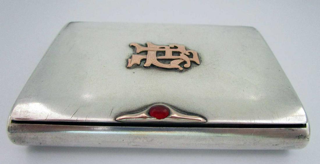 FABERGE - RUSSIAN IMPERIAL SILVER & GOLD CIGARETTE CASE: FABERGE - RUSSIAN IMPERIAL SILVER & GOLD CIGARETTE CASE WITH A SOLID GOLD MONOGRAM. The item is very nice made and has a maker marks: Silver marked 875 standard and workmaster's mark for Erik K