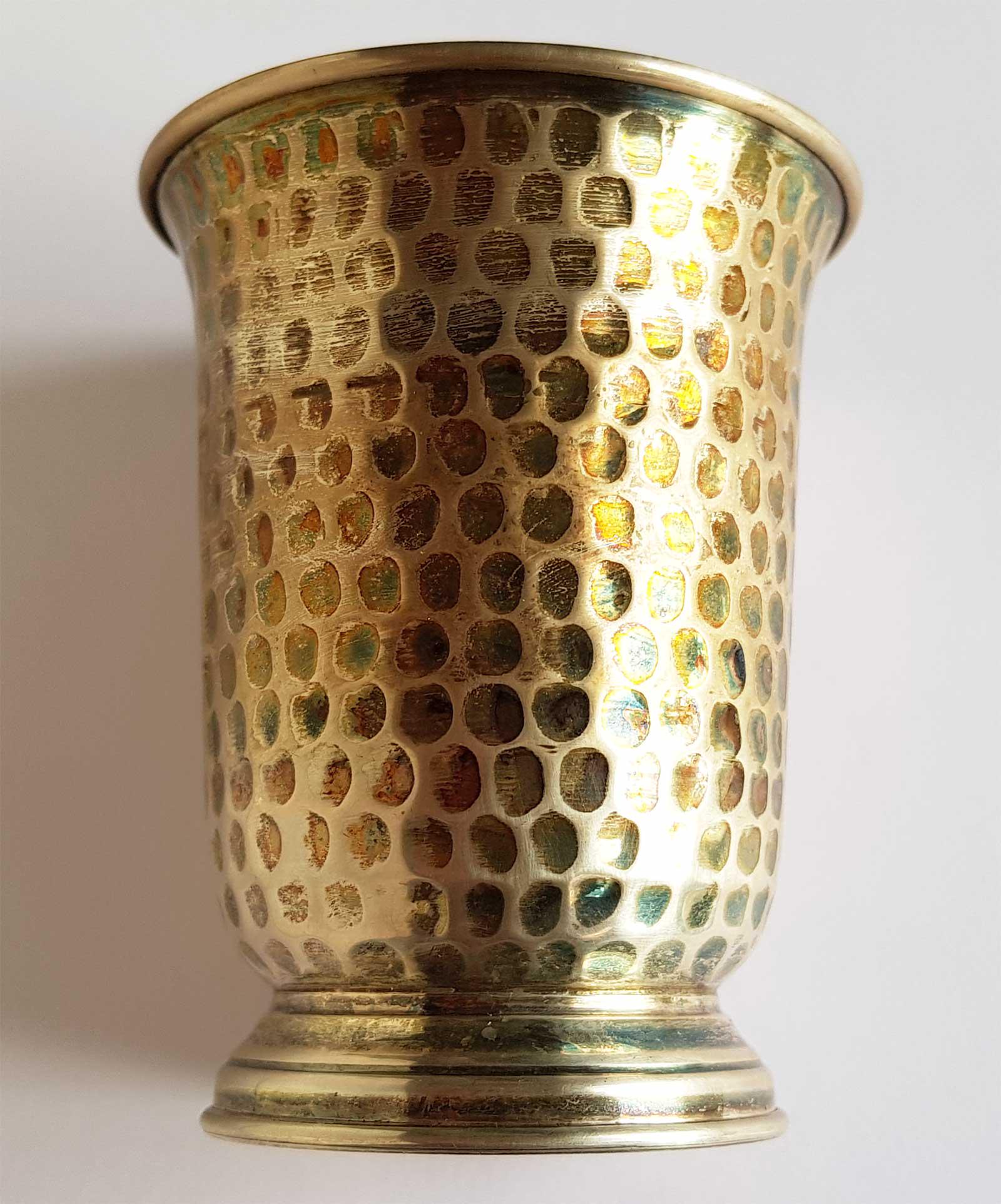 RARE JEWISH SILVER KIDDUSH CUP, JUDAICA: RARE JEWISH SILVER KIDDUSH CUP, JUDAICA A Silver kiddush cup features a graduating body, embellished along the front. Marked: 800 and 263EI (?). CONDITION: The item is described to the best of our kno