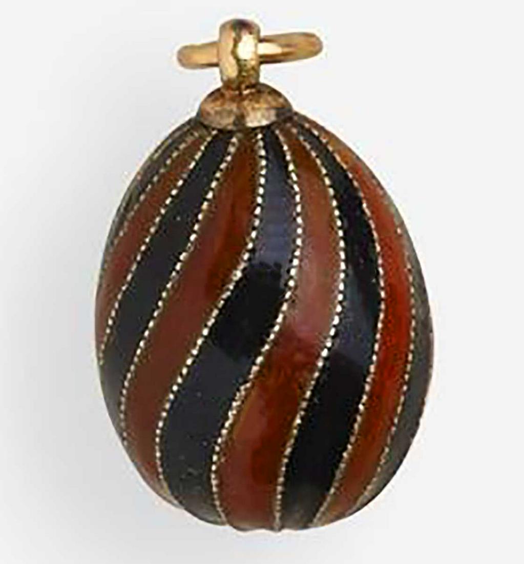 RUSSIAN IMPERIAL GUILLOCHE ENAMEL EGG PENDANT: RUSSIAN IMPERIAL GUILLOCHE ENAMEL EGG PENDANT In the manner of Faberge, Russian SILVER GILT or GOLD (?) and ENAMELED egg pendant. The egg is made with gilt washed finish. Also it has a Russian Imperia
