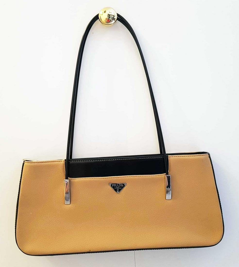 PRADA SHOULDER BAG HANDBAG: PRADA SHOULDER BAG HANDBAG BLACK and BEIGE WOMEN'S BAG. This handbag is very good condition. Very fashionable and elegant handbag. Interior zip pocket. Dimensions: 35 x 15.5 x 5.5 cm (13 3/4 x 6 1/4 x