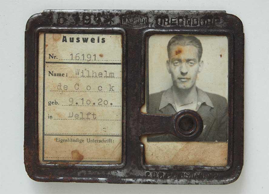 GERMAN WW2 ID w. PHOTO fr. CONCENTRATION CAMP: GERMAN WW2 ID with PHOTO from CONCENTRATION CAMP This ID was used in Mauser Werk belonged to concentration camp. Please look at WIKIPEDIA. The item is in good aged condition. The document has an EXTRE
