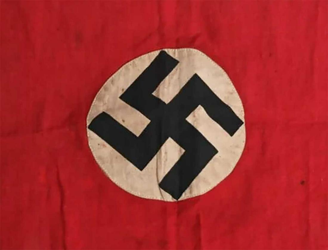 GERMAN WWII NAZI NSDAP BANNER w. SWASTIKA: GERMAN WW2 NAZI NSDAP BANNER with SWASTIKA Multi-piece cotton construction banner. To both its red fields are sewn white disks, with a printed mobile swastikas in black. CONDITION: Shows the expected 