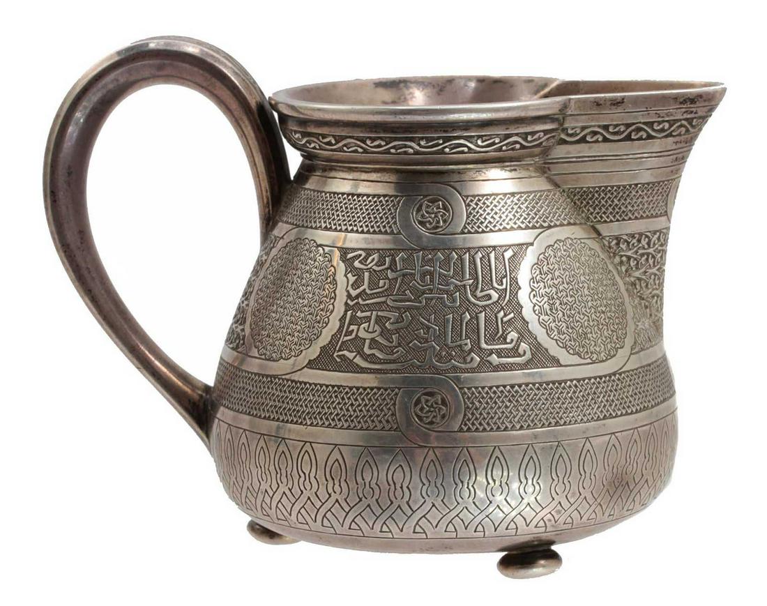 IVAN KHLEBNIKOV - RUSSIAN SILVER CREAMER, 19th C: VERY RARE IVAN KHLEBNIKOV - RUSSIAN SILVER CREAMER, 19th C. A delightful Russian silver creamer in the style of the Ottoman Empire. Decorated with engraving depicting fine detailed Islamic motifs, geo