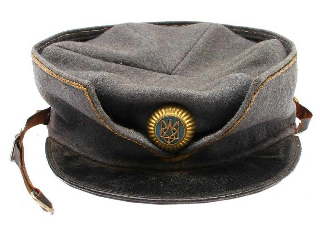 UKRAINIAN UPA-OUN OFFICER: EXTREMELY RARE UKRAINIAN UPA-OUN OFFICER'S VISOR CAP with BADGE, UKRAINIAN INSURGENT ARMY, 1939-1954 WWII Ukrainian Insurgent Army officer's hat with original badge. Ca. 1949 - extremely rare !!! From