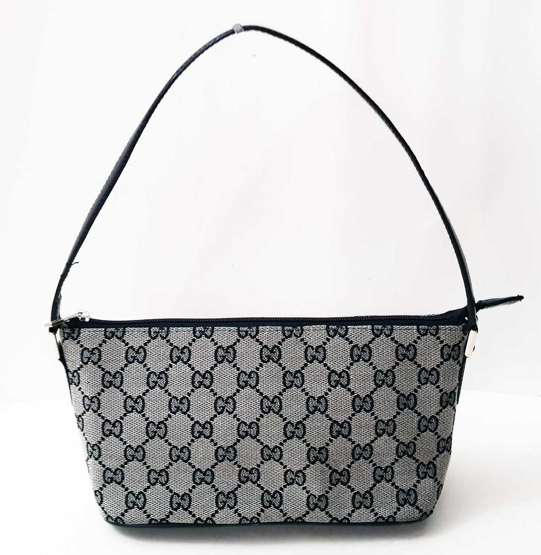 GUCCI CLUTCH POCHETTE BAG: USED GUCCI GG CANVAS ABBEY POCHETTE BAG Vintage Gucci small shoulder bag. This Gucci GG Canvas Abbey Pochette Bag is perfect for carrying at night or day when you feel like traveling light. It feature