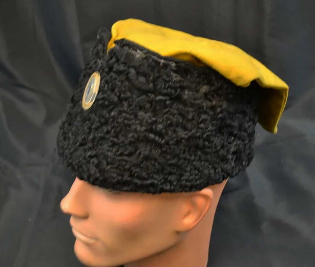 RARE UKRAINIAN NATIONALIST HAT w. BADGE, 1917: EXTREMELY RARE UKRAINIAN NATIONALIST HAT with BADGE, 1917 WWI 1917 Ukrainian nationalist west region hat. Extremely rare. WWI and Russian Civil war ears. Lamb fur. Traditional Ukrainian with yellow ko