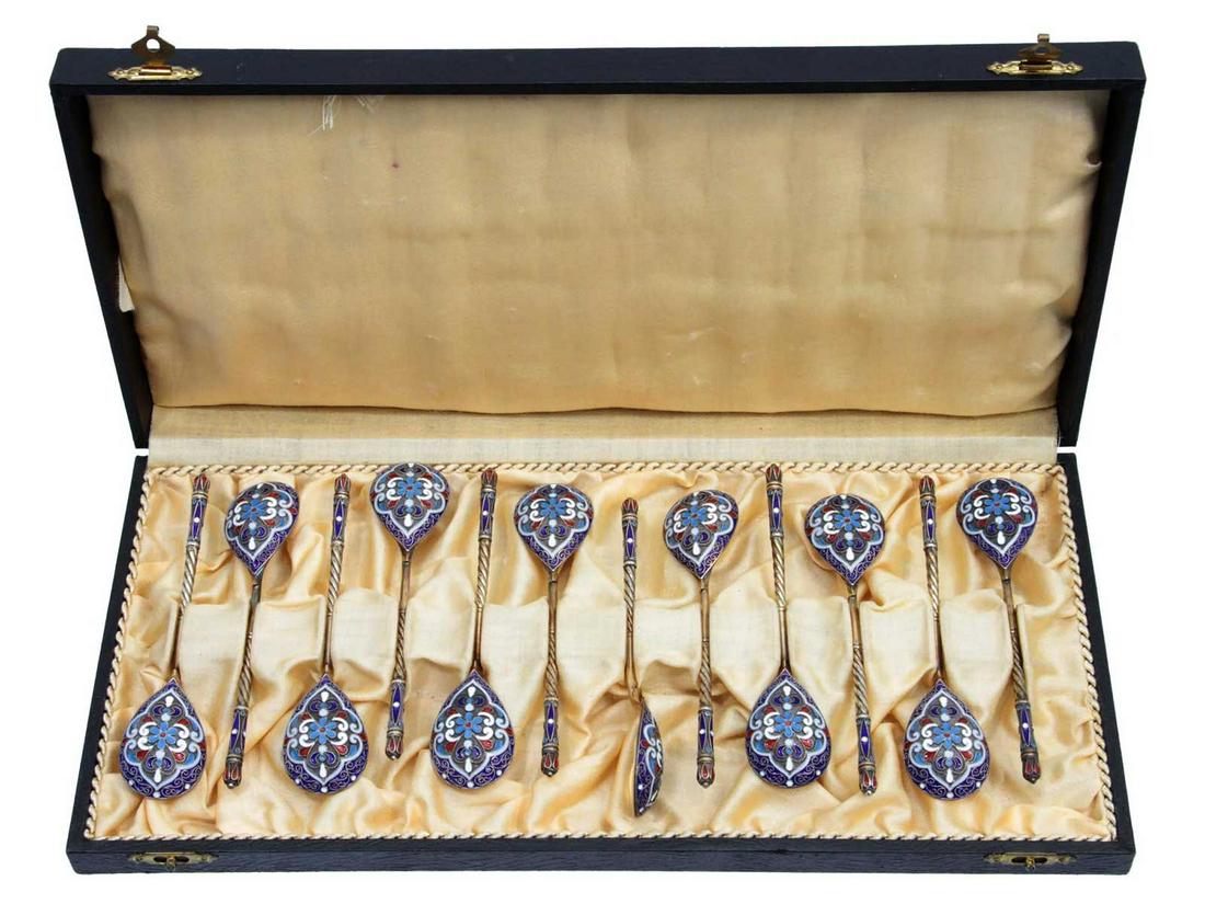 ANTIQUE RUSSIAN 12 SILVER & ENAMEL SPOONS, 1892: RUSSIAN ANTIQUE 12 SILVER and ENAMEL SPOONS, 1892 A set of 12 silver gilded coffee spoons. Pattern from polychrome enamel in red, blue and white tones on filigree. Stamps: 84 silver standard, 1892, ma