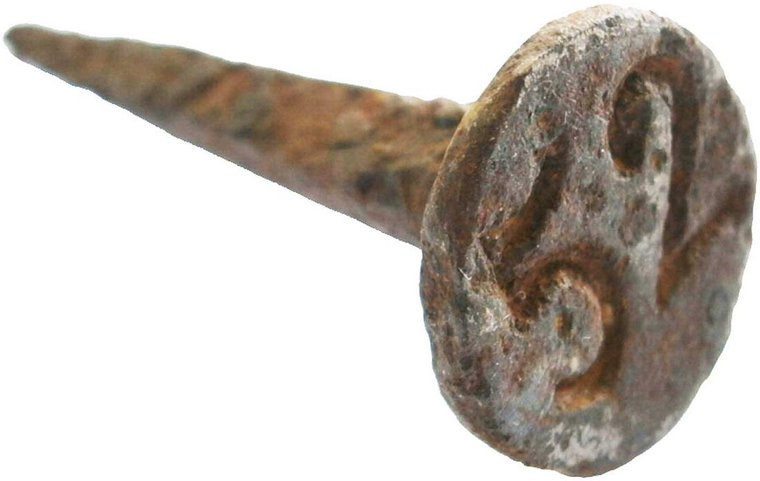 EUROPEAN ANTIQUE IRON NAIL w. NUMBER 52: EUROPEAN ANTIQUE IRON NAIL with NUMBER 52 CONDITION: The item is described to the best of our knowledge. Please refer to pictures and email with any questions. DIMENSIONS: 55 x 23 mm (2.17 x 0.91 inch