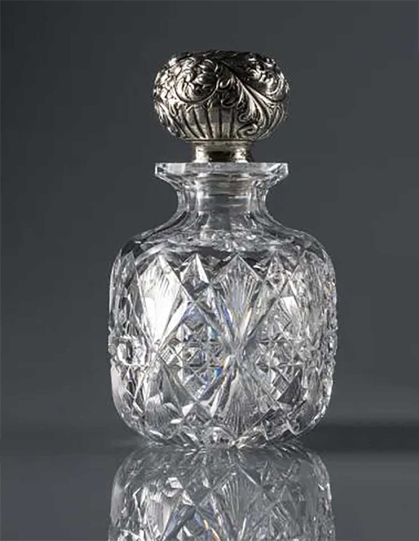 CUT CRYSTAL SILVER SPIRIT DECANTER, GROTHAM 1897: RARE CUT CRYSTAL SILVER SPIRIT DECANTER, GROTHAM 1897 19th century cut crystal spirit decanter of barrel form rising to faceted collars. Fitted with Gorham sterling silver clad stoppers engraved 'MINN