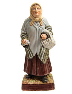 GARDNER - RUSSIAN PORCELAIN JEWISH FIGURINE, 19th C.: GARDNER - RUSSIAN IMPERIAL PORCELAIN JEWISH FIGURINE, 19th CENTURY A Gardner Porcelain Factory figurine of an Old JEWISH woman. with a makers oval red stamp 'Gardner factory in Moscow' under the