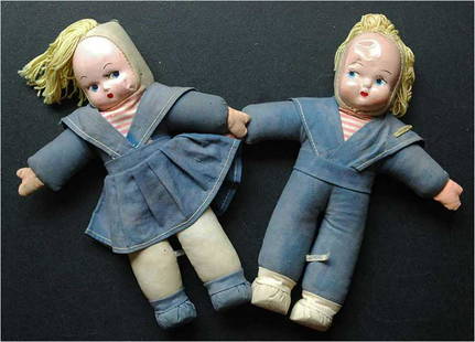 RARE WW2 SAILOR DOLLs from GHETTO in HUNGARY: RARE WW2 SAILOR DOLLs from GHETTO in HUNGARY Here is a vintage of cloth dolls - circa 1940's. This is cloth with thin celluloid faces. Have great face and hair - matching sailor clothe - cloth body. 