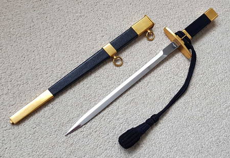 FRENCH WW2 AIR FORCE OFFICERS DAGGER, 1934: RARE FRENCH WW2 AIR FORCE OFFICERS DAGGER, MODEL 1934 All metal parts of the hilt, crossguard, and scabbard fittings are gilded, navy blue plastic grip, nickel plated blade, with two retention