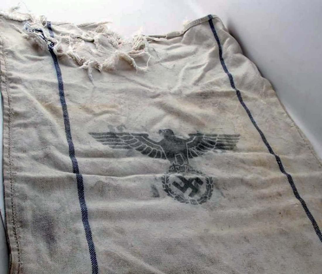 GERMAN WW2 BAG w. SWASTIKA, 1944: GERMAN WW2 BAG with SWASTIKA, 1944 The bag is too large and have a few Stamps and year 1944. TEST: This particular item passed very important test - it does not glow under the black lamp (all fabrics 