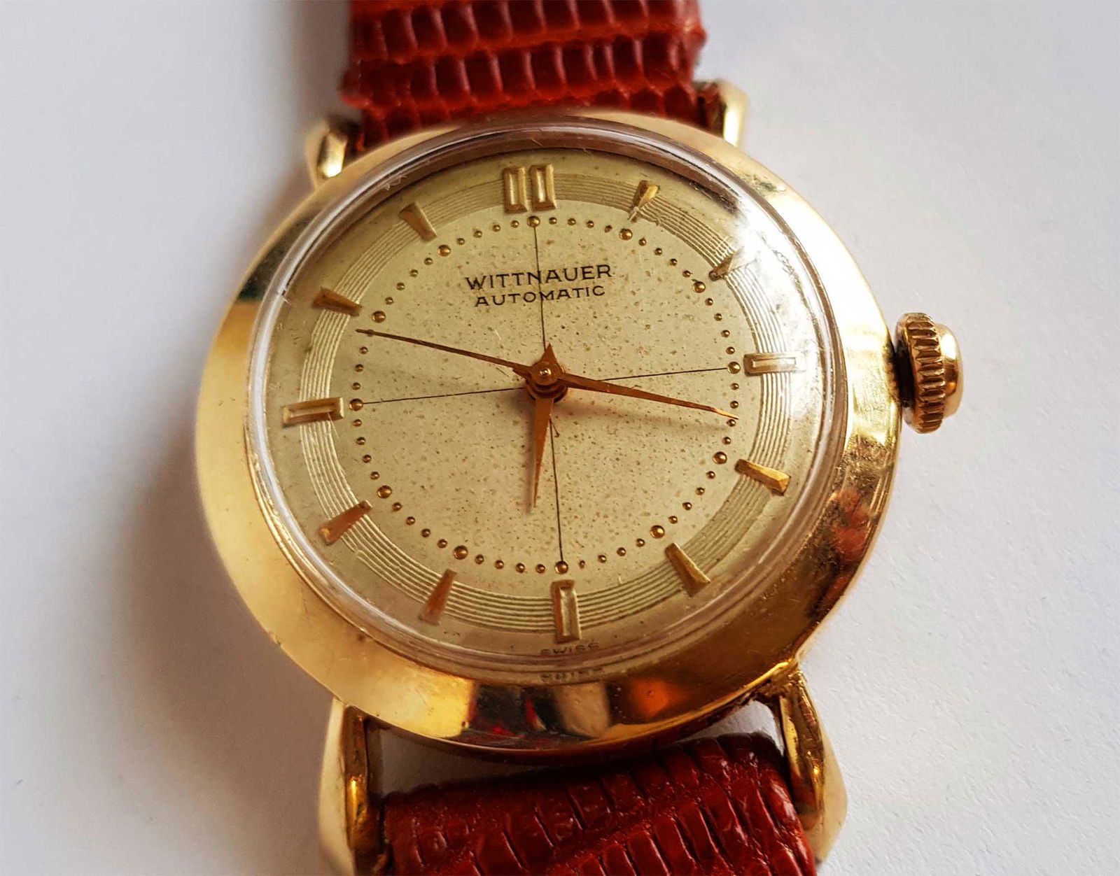 GOLD AUTOMATIC MENS WRISTWATCH, WITTNAUER: GOLD AUTOMATIC MENS WRISTWATCH, WITTNAUER Mens gold Wittnauer automatic wristwatch. Has a great look to it with an excellent overall eye appeal. Has a solid gold case. A great find and an excellent ad