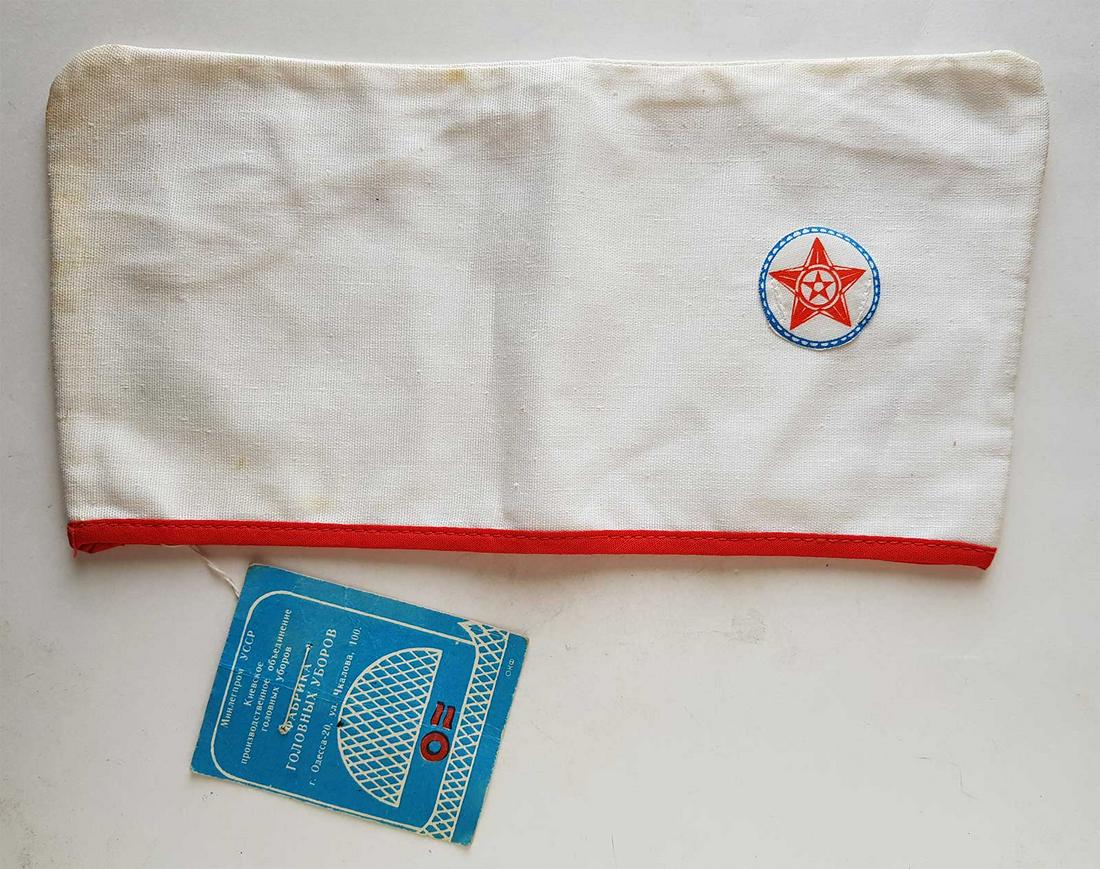 RUSSIAN-UKRAINIAN PIONEER CAP w. LABEL, 1988: RUSSIAN-UKRAINIAN PIONEER CAP with LABEL, 1988 The cap in white colour is more rareres than in red colour. The cap is made in 1988 in Odessa, Ukraine. ESTIMATE PRICE: $50 - $200. NO RESERVE: More than