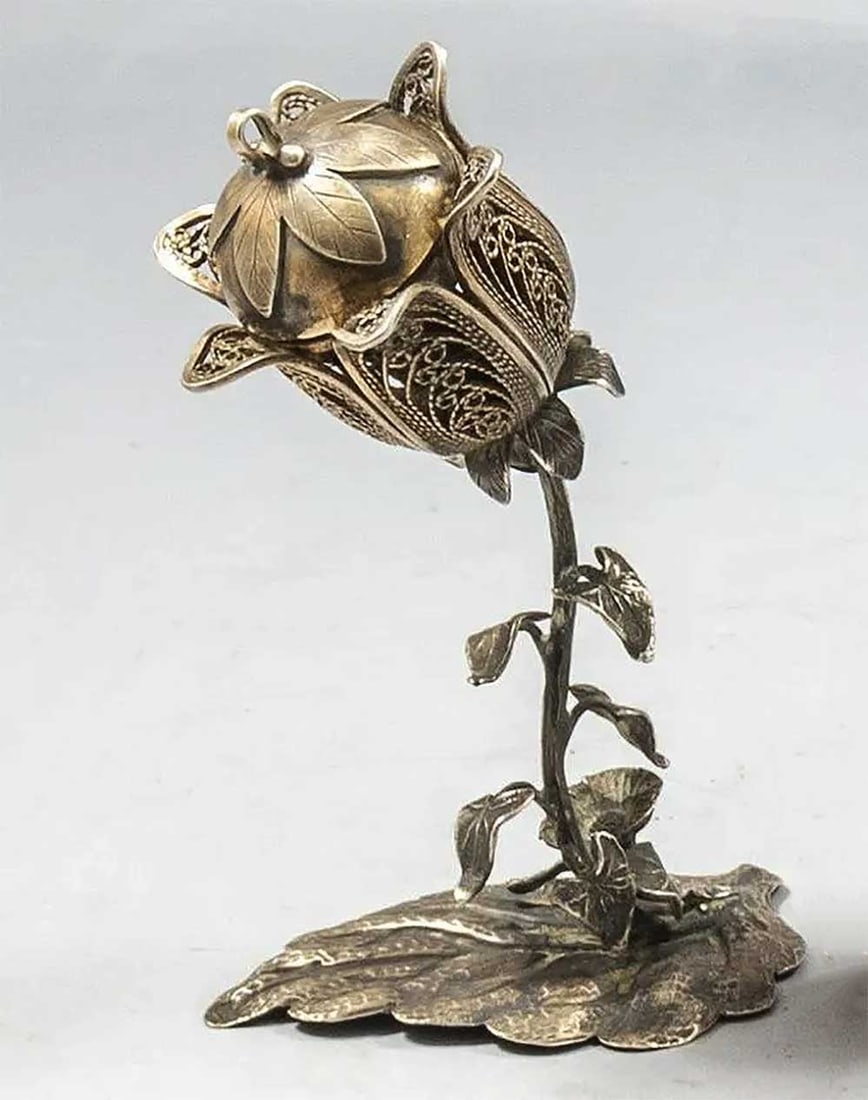 JEWISH SILVER BESAMIM SPICE CONTAINER, 19c.: RARE JEWISH SILVER BESAMIM SPICE CONTAINER, 19th CENTURY This 19th-century Jewish silver Besamim spice container is designed in the shape of a rare flower. The Besamim spice box is traditionally used 