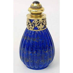 FABERGE - PERFUME BOTTLE, SILVER & DIAMOND's: FABERGE - SILVER and DIAMOND's ENAMELED PERFUME BOTTLE This is a Russian perfume bottle made of Lapis Lazuli, silver, and diamonds. It's a beautiful Faberge item. When you touch and hold a piece of