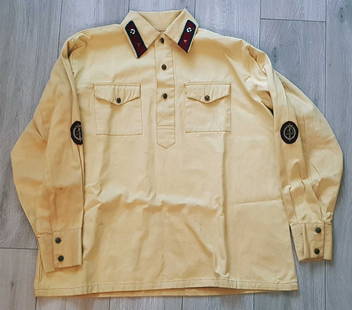 RUSSIAN NKVD OFFICER UNIFORM SHIRT, 1930x: RARE SOVIET RUSSIAN NKVD OFFICER UNIFORM SHIRT, 1930x Rare Russian NKVD (later KGB) summer white shirt. The white material has aged, resulting in yellowing. It features high-quality embroidered NKVD s