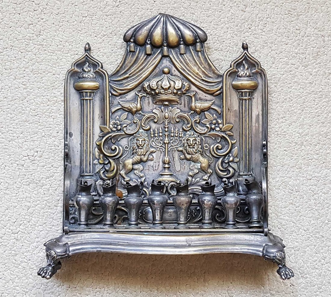 RARE JEWISH OIL BURNING HANUKKAH LAMP, 1890: RARE FRAGET JEWISH OIL BURNING HANUKKAH LAMP, 1890 Jewish oil-burning Hanukkah lamp from 1890, representing Judaica revivalism. It features a combination of rococo scrollwork, a diamond pattern, and G