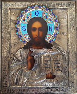 RUSSIAN SILVER and ENAMEL ICON: ANCIENT SILVER ORTHODOX ICON with SAVIOR PANTOCRATOR Antique Russian Orthodox icon of Christ, hand painted. Silver gilt chasuble or frame with silver gilt engraving and cloisonne enamel halo. The icon