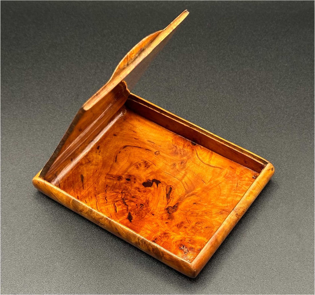 ANTIQUE RUSSIAN KARELIAN BIRCH CIGARETTE CASE: Wonderful Gift! ANTIQUE RUSSIAN KARELIAN BIRCH CIGARETTE CASE Antique Russian Karelian birch wood presentation cigarette case with a seamless hidden hinge, circa the late 19th century. We are selling 