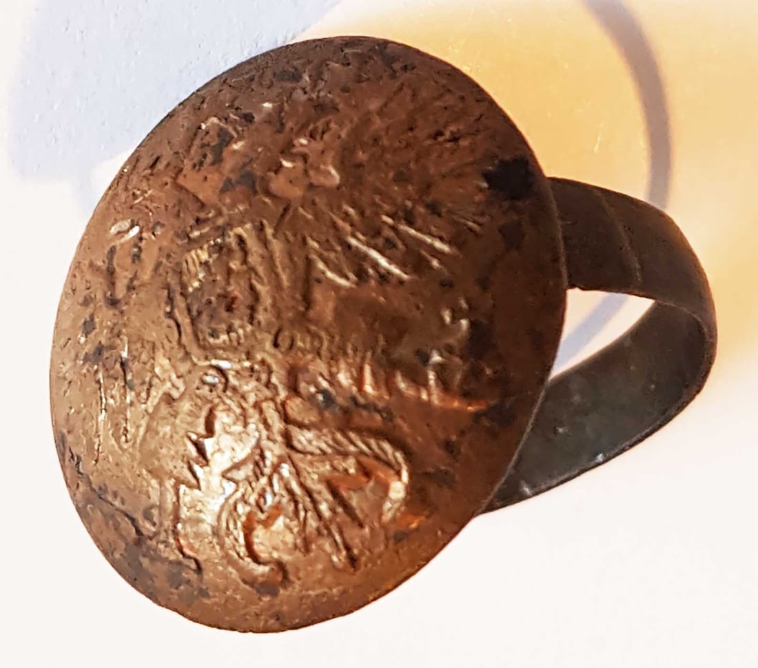 RUSSIAN IMPERIAL RING w. COAT of ARMS: The Great Display Piece! With Huge Historical Value! RUSSIAN IMPERIAL RING with COAT of ARMS This is a piece of trench art, a form of artistry that was highly popular during its time. CONDITION: Very 