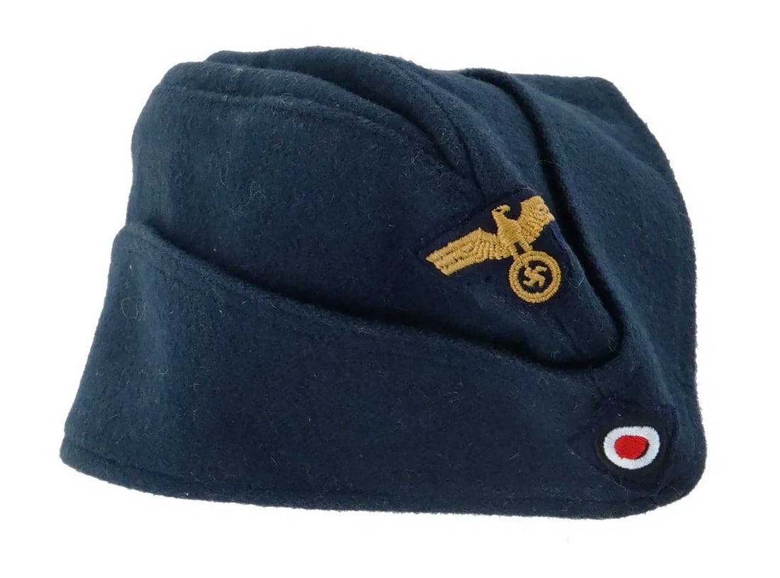 GERMAN WWII KRIEGSMARINE OFFICERS SIDE CAP: Rare and Collectible! GERMAN WWII KRIEGSMARINE OFFICERS SIDE CAP For your consideration is a WWII Nazi German Kriegsmarine officer’s side cap. The exterior is made of dark blue wool fabric, typical 