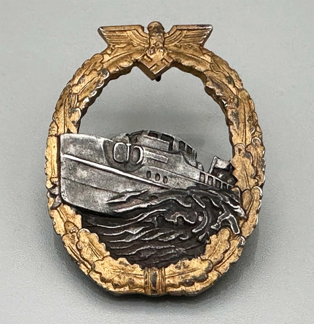 GERMAN WWII THIRD REICH E-BOAT BADGE: Great Display Piece! GERMAN WWII TORPEDO BOAT WAR BADGE, SCHNELLBOOT, E-BOAT Kriegsmarine Fast Attack Craft War Badge, 1st type. Torpedo Boat War Badge was instituted on May 30, 1941. It was awarded t