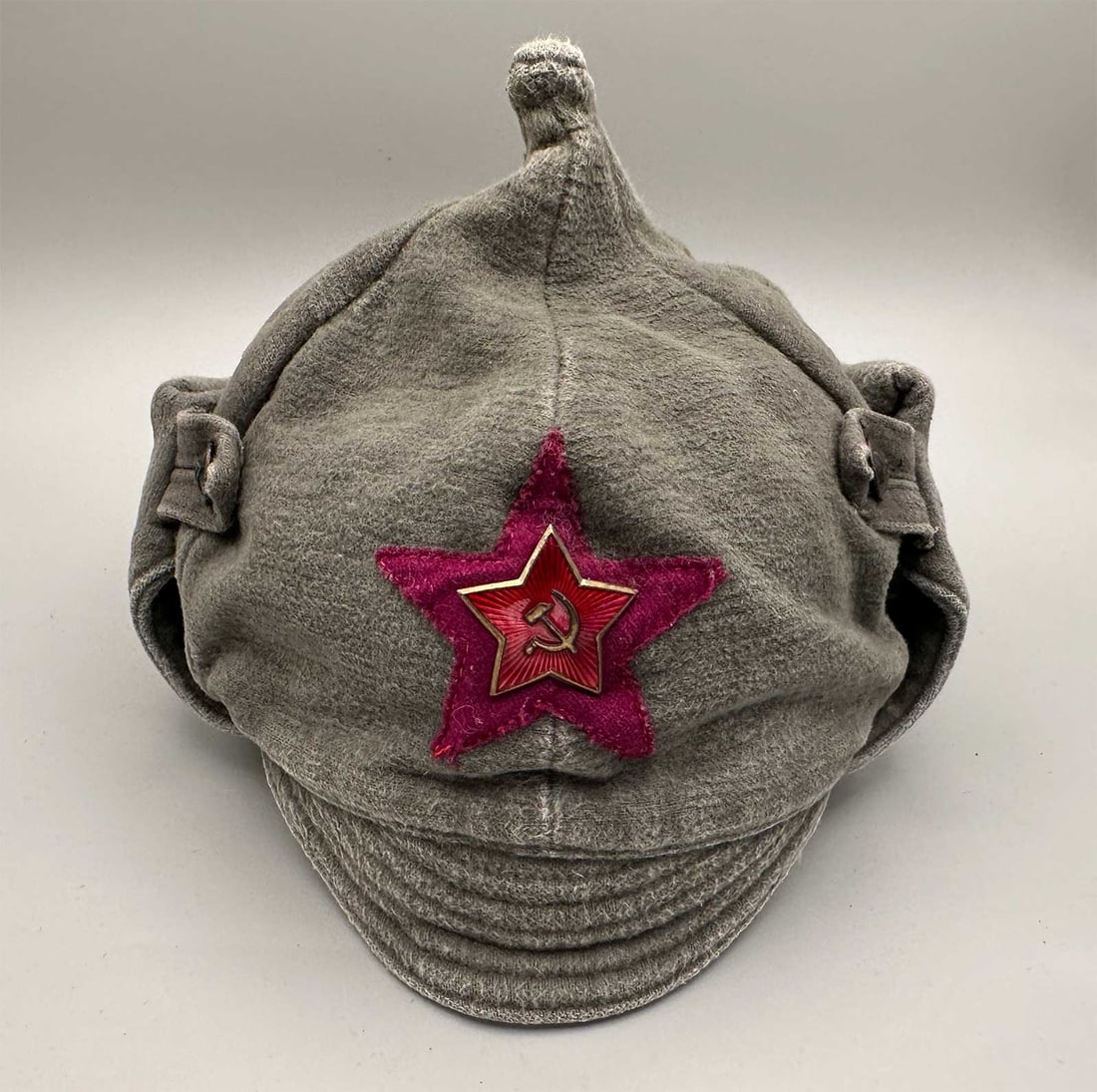 RUSSIAN EARLY USSR RED ARMY BUDYONOVKA, 1920x: Lifetime Warranty! Museum Item with Huge Historical Value! RUSSIAN EARLY USSR RED ARMY BUDYONOVKA, 1920x For your viewing pleasure, here is an early USSR Budenovka helmet in gray cloth adorned with a 