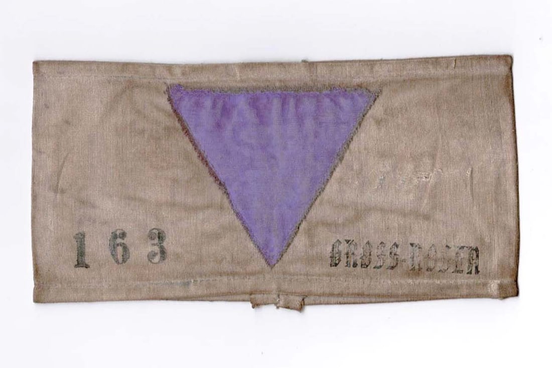 GERMAN WW2 ARMBAND for JEHOVAH'S WITNESSES: Great Display Piece! GERMAN WW2 ARMBAND with PURPLE TRIANGLE for JEHOVAH'S WITNESSES from GROSS-ROSEN CONCENTRATION CAMP This rare WWII-era concentration camp armband features a painted purple triangl