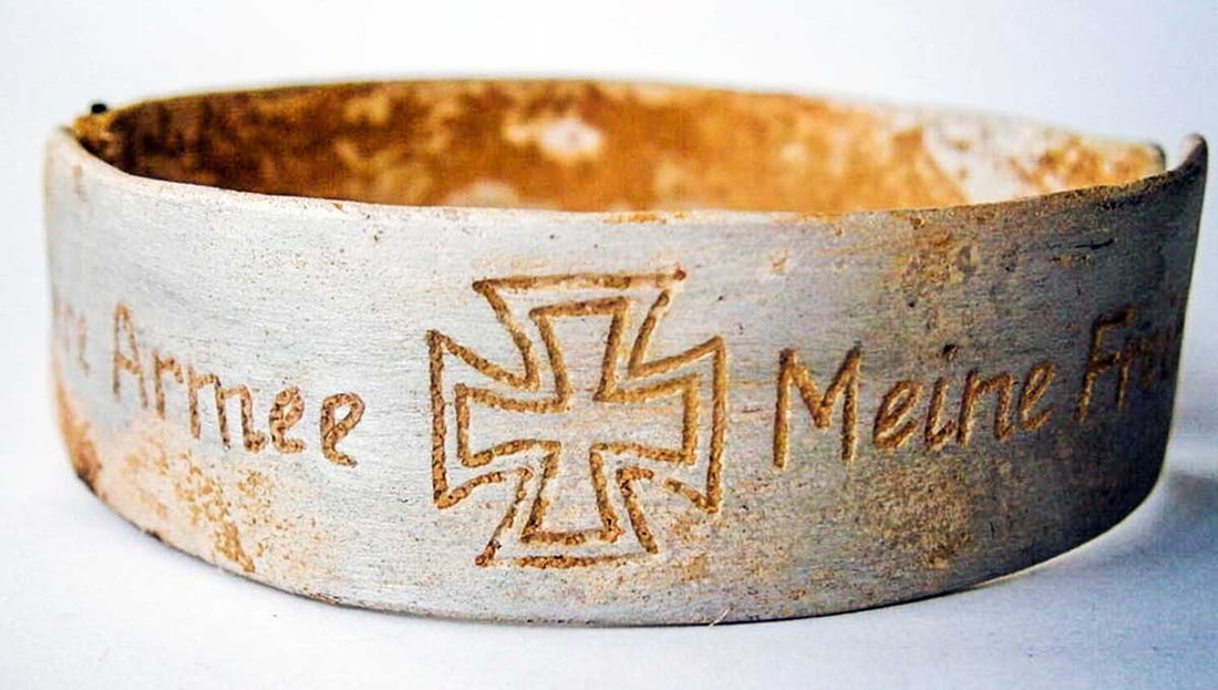 GERMAN WWII BRACELET w. IRON CROSS, MEINE ARMY: Trench Art with Huge Historical Value! GERMAN WWII BRACELET with IRON CROSS, MEINE ARMY German WWII bracelet with an Iron Cross and the engraving 'MEINE ARMY'. The engraving is executed using an old t