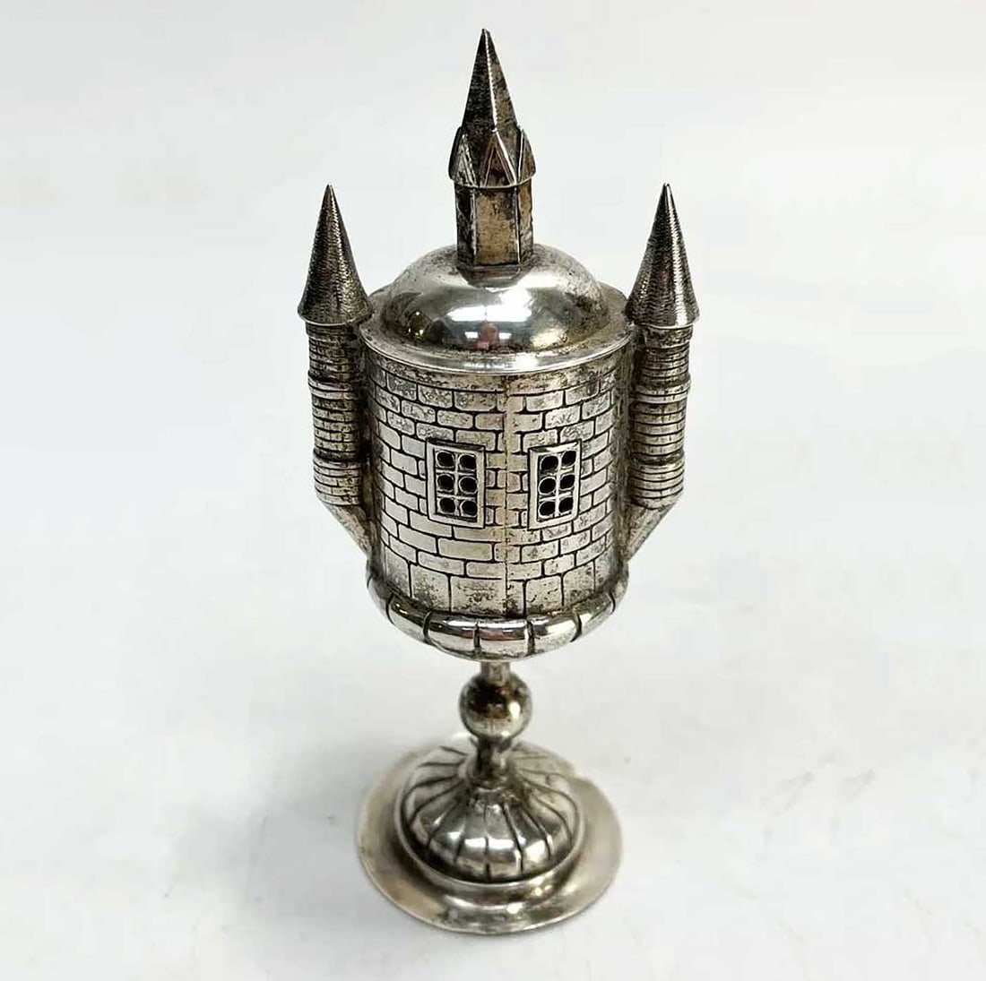 JEWISH SILVER BESAMIM, SPICE TOWER, c.1760: Great Display Piece! JEWISH SILVER BESAMIM, SPICE TOWER, JUDAICA, c.1760 This is a German Jewish silver Besamim spice tower, circa 1760, crafted in the form of a silver castle with a functioning minia