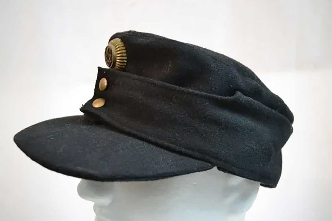 GERMAN - UKRAINIAN WWII HAT w. BADGE: Display Piece! Price Reduced — Limited-Time Offer! EXTREMELY RARE GERMAN-UKRAINIAN WWII NATIONALIST HAT with BADGE WWII black wool German-made Ukrainian nationalist hat. This black panzer wool m43 h