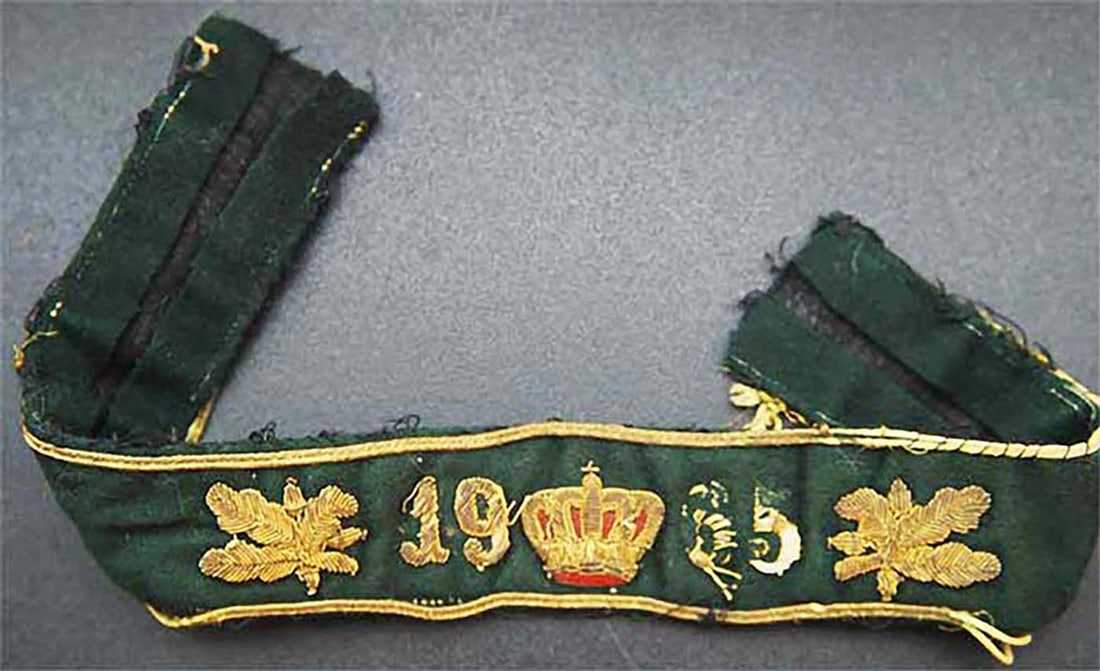 GERMAN WW1 CUFF TITLE, CROWN, DATED, OAKLEAVES (1 of 11)