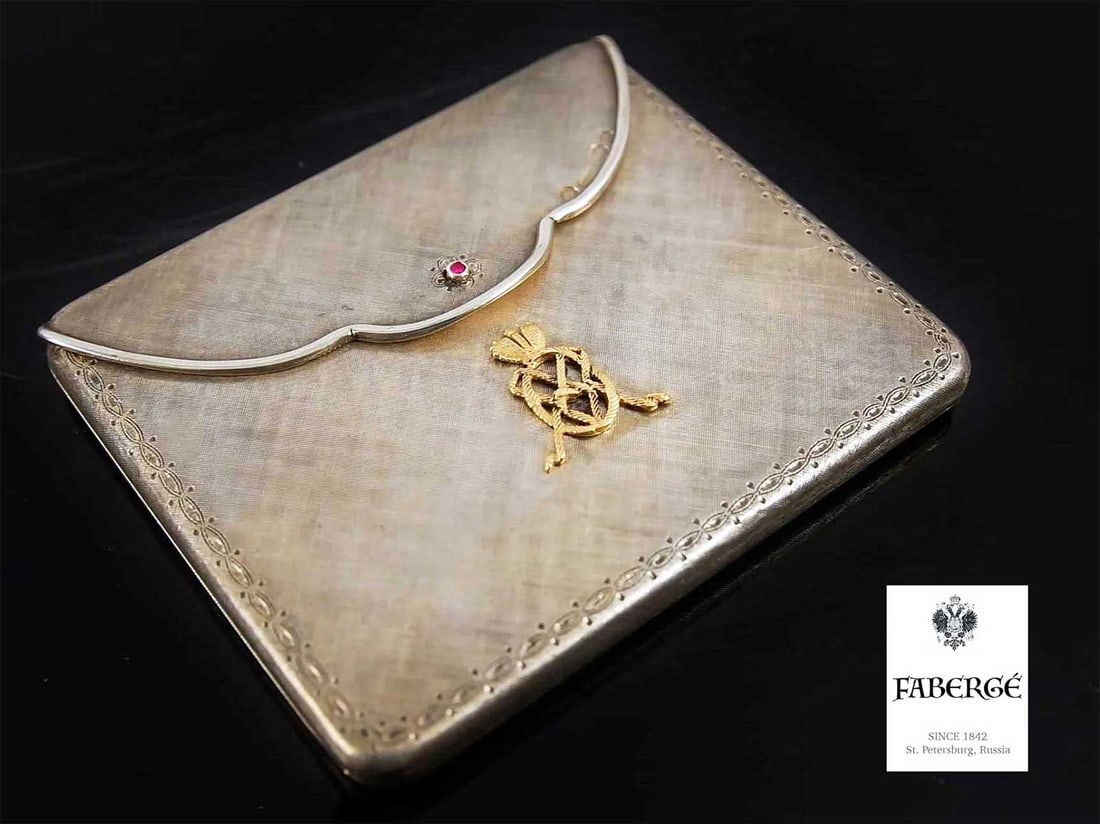 FABERGE - GOLD, SILVER & RUBY RUSSIAN COMPACT: LifeTime Warranty! Price Reduced — Limited-Time Offer! FABERGE - GOLD, SILVER & RUBY RUSSIAN FOLDING COMPACT For your viewing pleasure, here is a gorgeous FABERGE ladies' envelope-style folding 3-pi