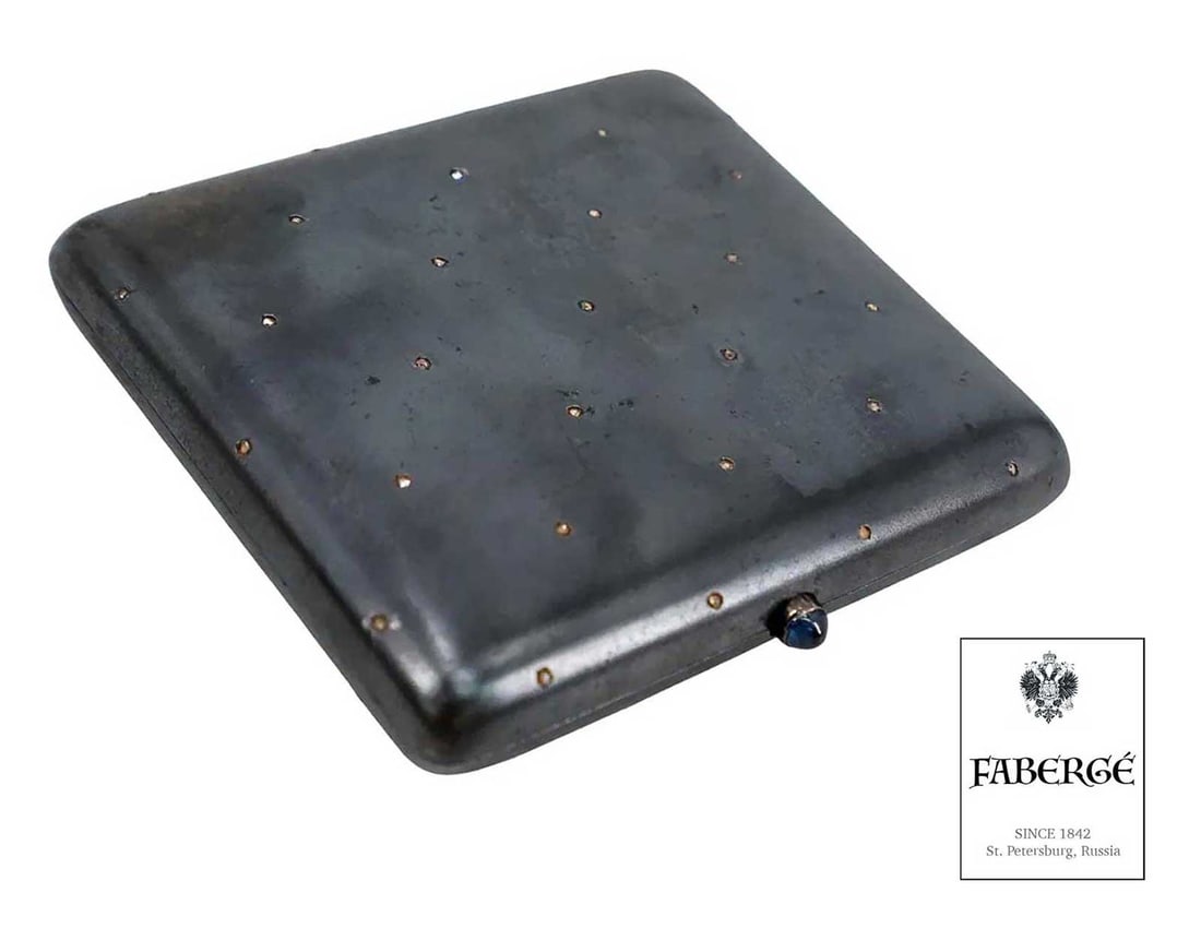 FABERGE - DIAMONDS & GUN METAL CIGARETTE CASE: Prestigious Gift! Price Reduced — Limited-Time Offer! FABERGE - DIAMONDS and GUN METAL CIGARETTE CASE This is a Russian silver cigarette case featuring gunmetal. The exterior is adorned with 62 (!!)