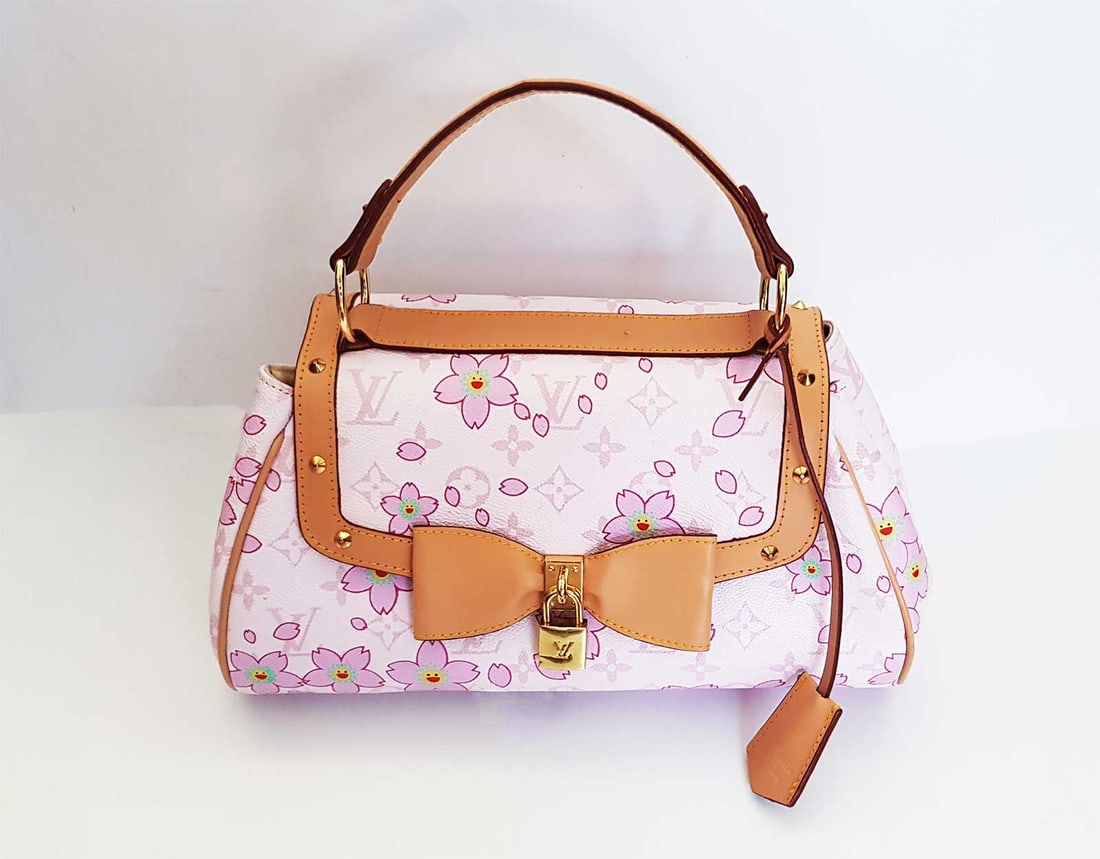 LOUIS VUITTON CHERRY BLOSSOM MONOGRAM M92012: LOUIS VUITTON PINK CHERRY BLOSSOM MONOGRAM CANVAS SAC RETRO PM BAG A rare and hard to find piece crafted from Takashi Murakami's elegant cherry blossom monogram canvas. This bag offers nothing but