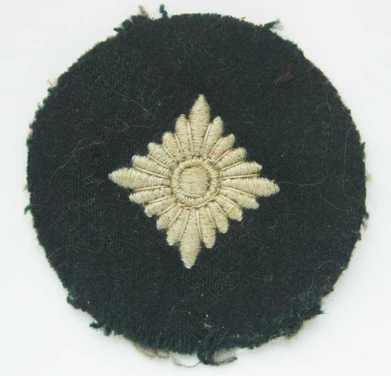 GERMAN WWII GREEN LONG SERVICE PATCH, STAMPED: Great Display Piece! Price Reduced — Limited-Time Offer! GERMAN WWII GREEN LONG SERVICE PATCH, STAMPED German WWII green long-service patch, stamped. PROVENANCE: 1. From an old, large collection, pa