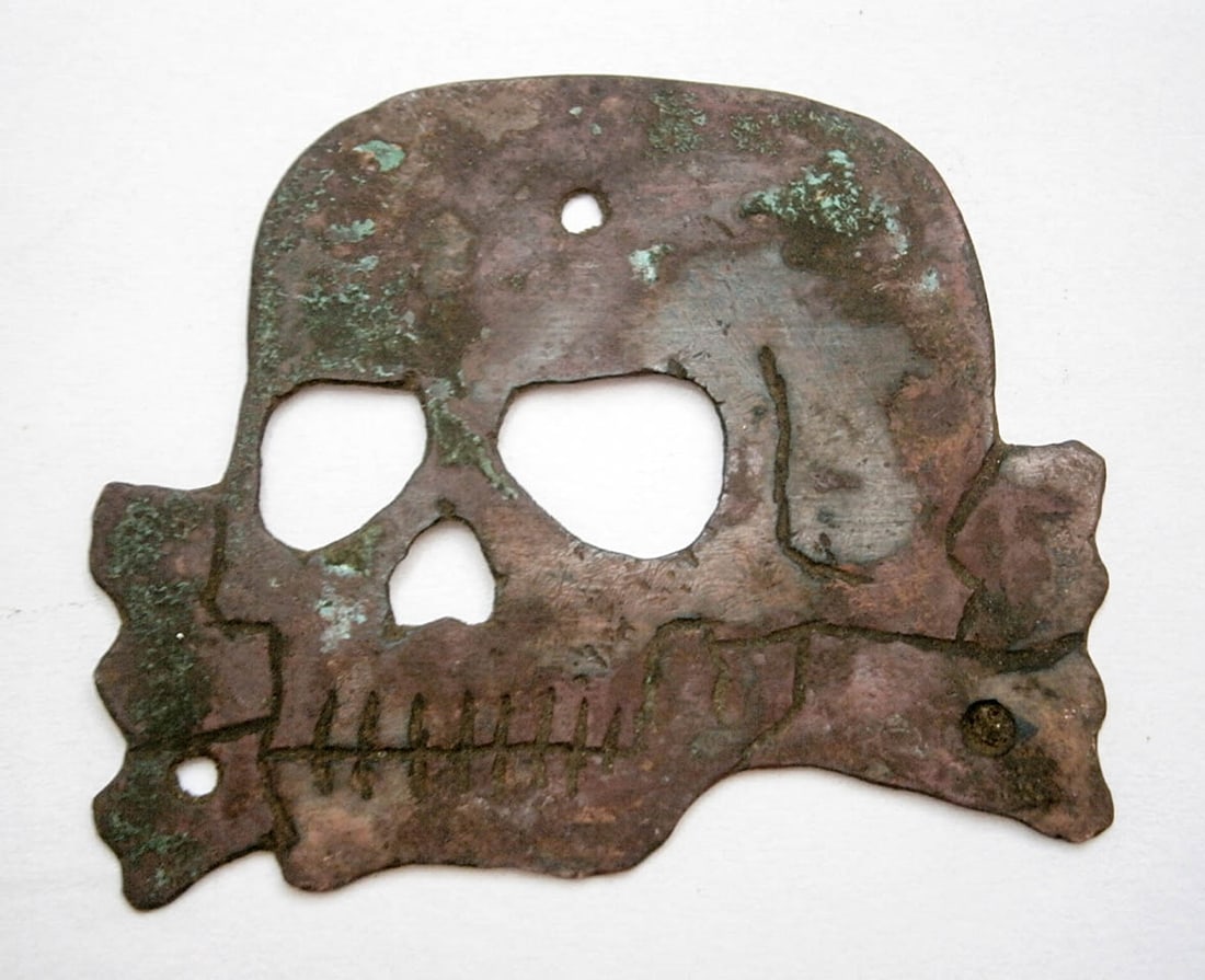 GERMAN WWII COCKADE w. SKULL & BONES: Display Piece! Price Reduced — Limited-Time Offer! GERMAN WWII COCKADE with SKULL and BONES German WWII COCKADE featuring a skull - bonesclassified as trench art. This item is rare and ideal for inc