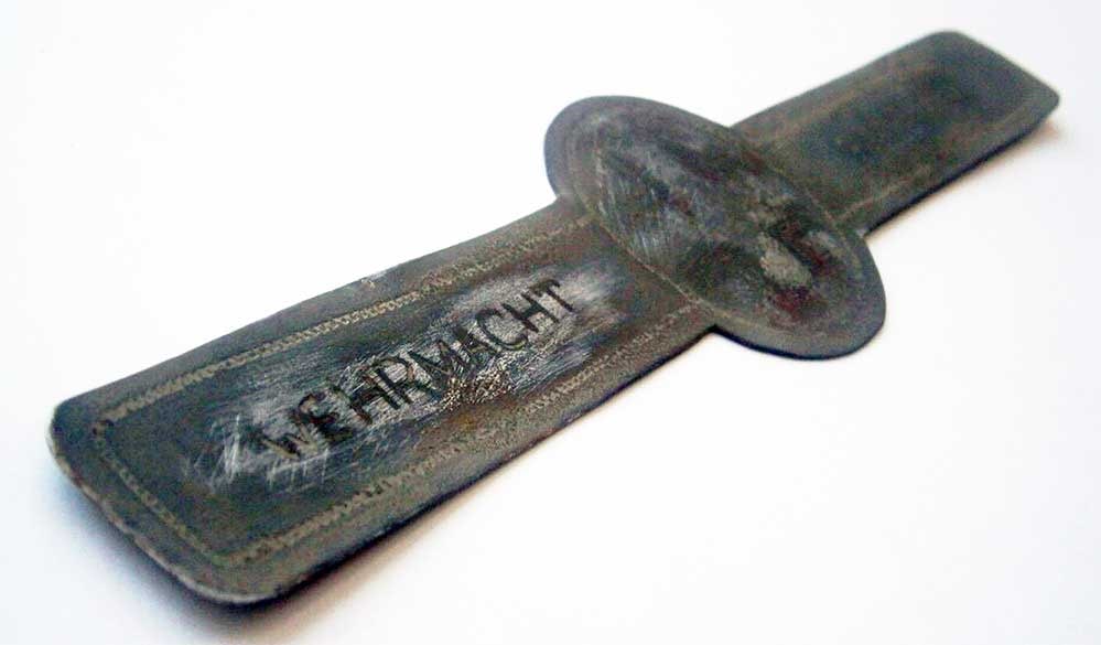 GERMAN WWII BRACELET w. IRON CROSS: Great Display Piece! Price Reduced — Limited-Time Offer! GERMAN WWII BRACELET with IRON CROSS German WWII bracelet with an engraved Iron Cross and the words 'RUSSLAND' and 'WEHRMACHT'. This piece is