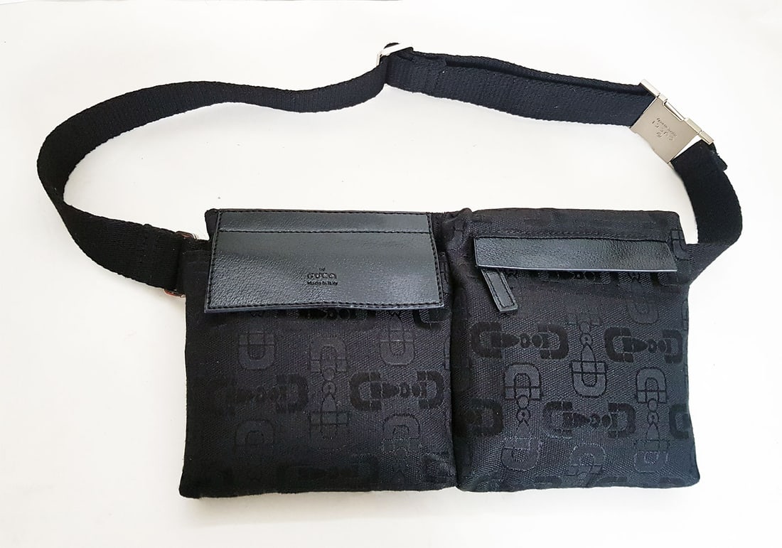 GUCCI BLACK CANVAS BELT BAG 002436: GUCCI BLACK MONOGRAM BELT BAG FANNY PACK WAIST BAG This belt bag by Gucci is crafted from black monogram fabric. Product code 001.3306. Serial number 002436. The back of this belt bag features a zip p