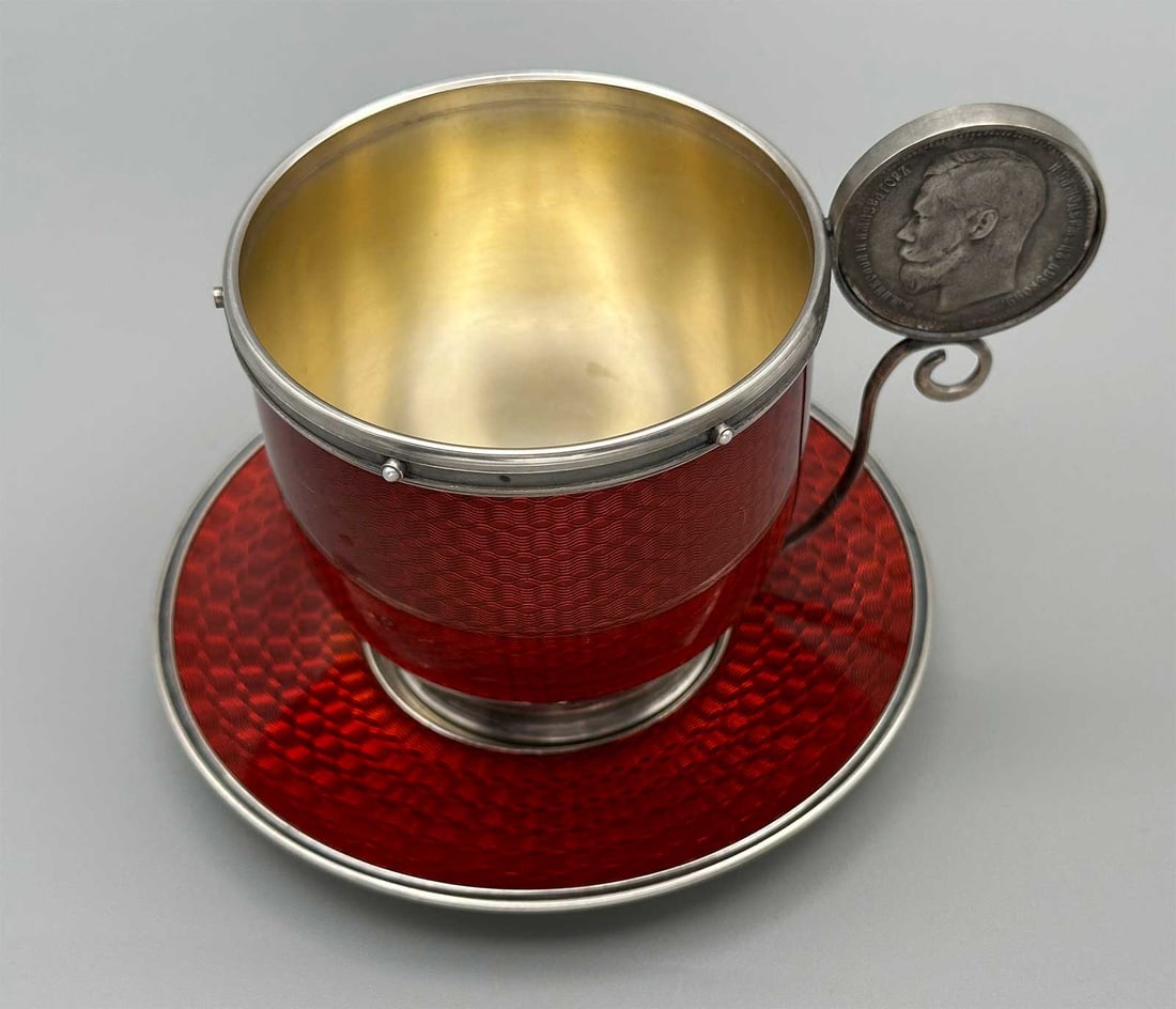 RARE RUSSIAN SILVER CUP AND SAUCER WITH RED GUILLOCHE ENAMEL AND RUBEL HANDLE: No Reserve! Limited-Time Price Reduction! RARE RUSSIAN SILVER CUP AND SAUCER WITH RED GUILLOCHE ENAMEL AND RUBEL HANDLE Presented is a rare antique Russian solid silver cup and saucer set, fully embel