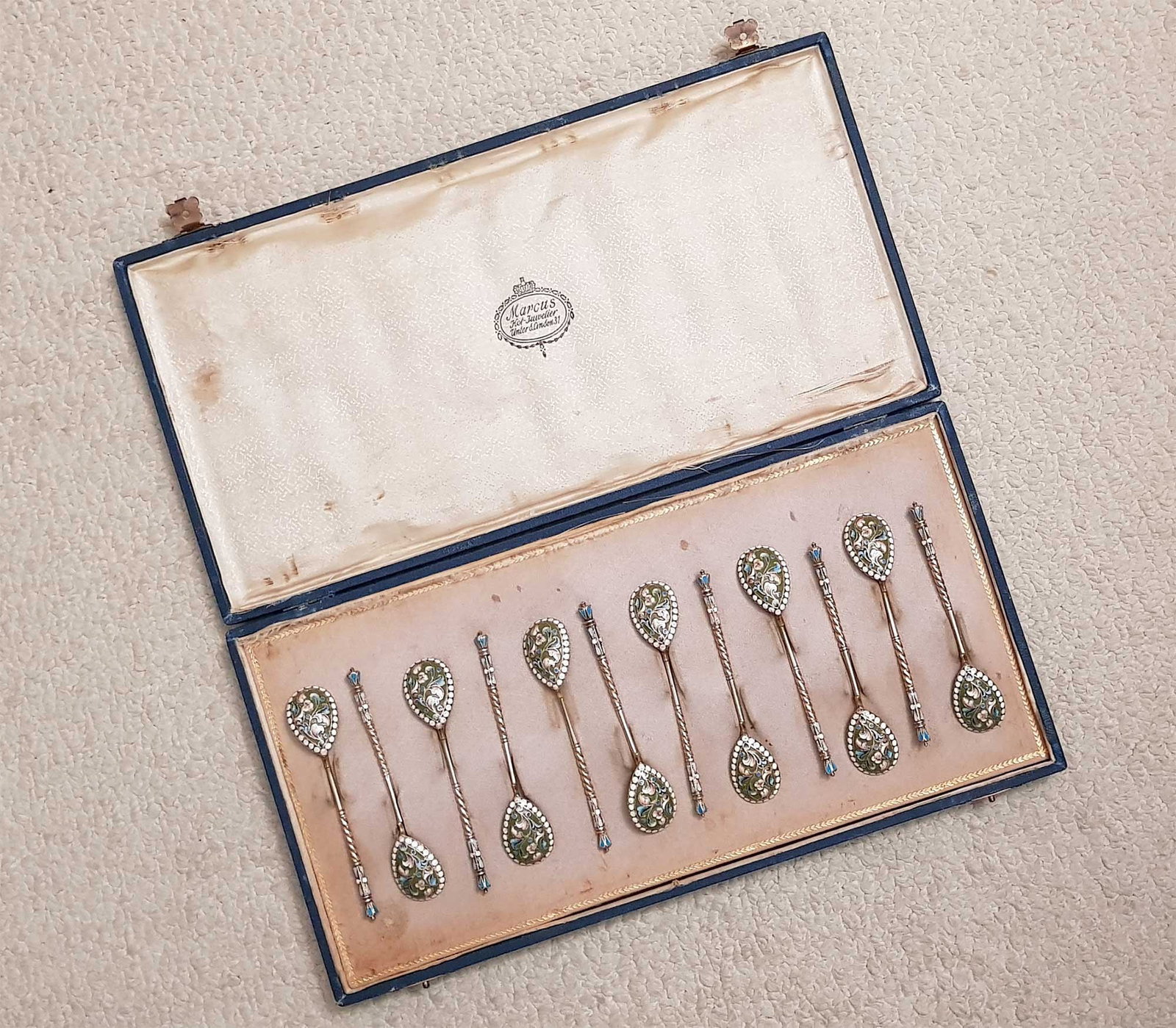 ANTIQUE RUSSIAN SILVER GILT & ENAMEL COFFEE SPOONS, SET OF 12, BOXED: No Reserve! Limited-Time Price Reduction! ANTIQUE RUSSIAN SILVER GILT & ENAMEL COFFEE SPOONS, SET OF 12, BOXED A fine set of twelve antique Russian silver gilt coffee spoons adorned with elegant ename