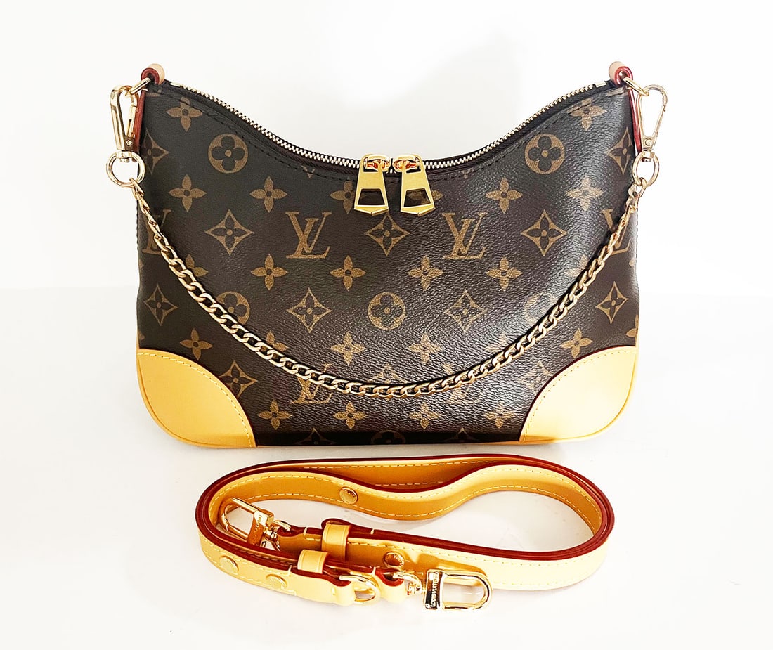 LOUIS VUITTON MONOGRAM NM, CODE RA2628: LOUIS VUITTON BOULOGNE NM HANDBAG MONOGRAM CANVAS BROWN This chic Pre-owned shoulder bag is crafted of classic Louis Vuitton monogram on toile canvas, with vachetta natural cowhide leather trim. The b