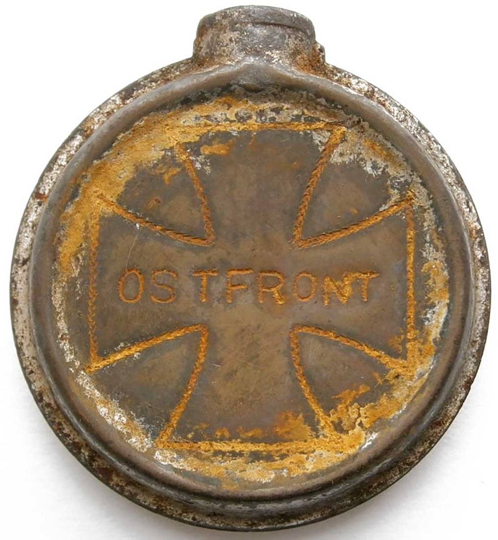 RARE GERMAN WWII OSTFRONT MILITARY OIL BOTTLE WITH IRON CROSS WEAPON CLEANING KIT: No Reserve! Limited-Time Price Reduction! RARE GERMAN WWII OSTFRONT MILITARY OIL BOTTLE WITH IRON CROSS WEAPON CLEANING KIT Presented is a rare German WWII military oil bottle from a weapon cleaning k